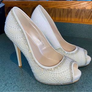 David's Bridal De Blossom Collection peep toe pumps / heels.